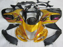 Gold, Black and Pink Fairing Kit for a 1999, 2000, 2001, 2002, 2003, 2004, 2005, 2006, & 2007 Suzuki GSX-R1300 Hayabusa motorcycle