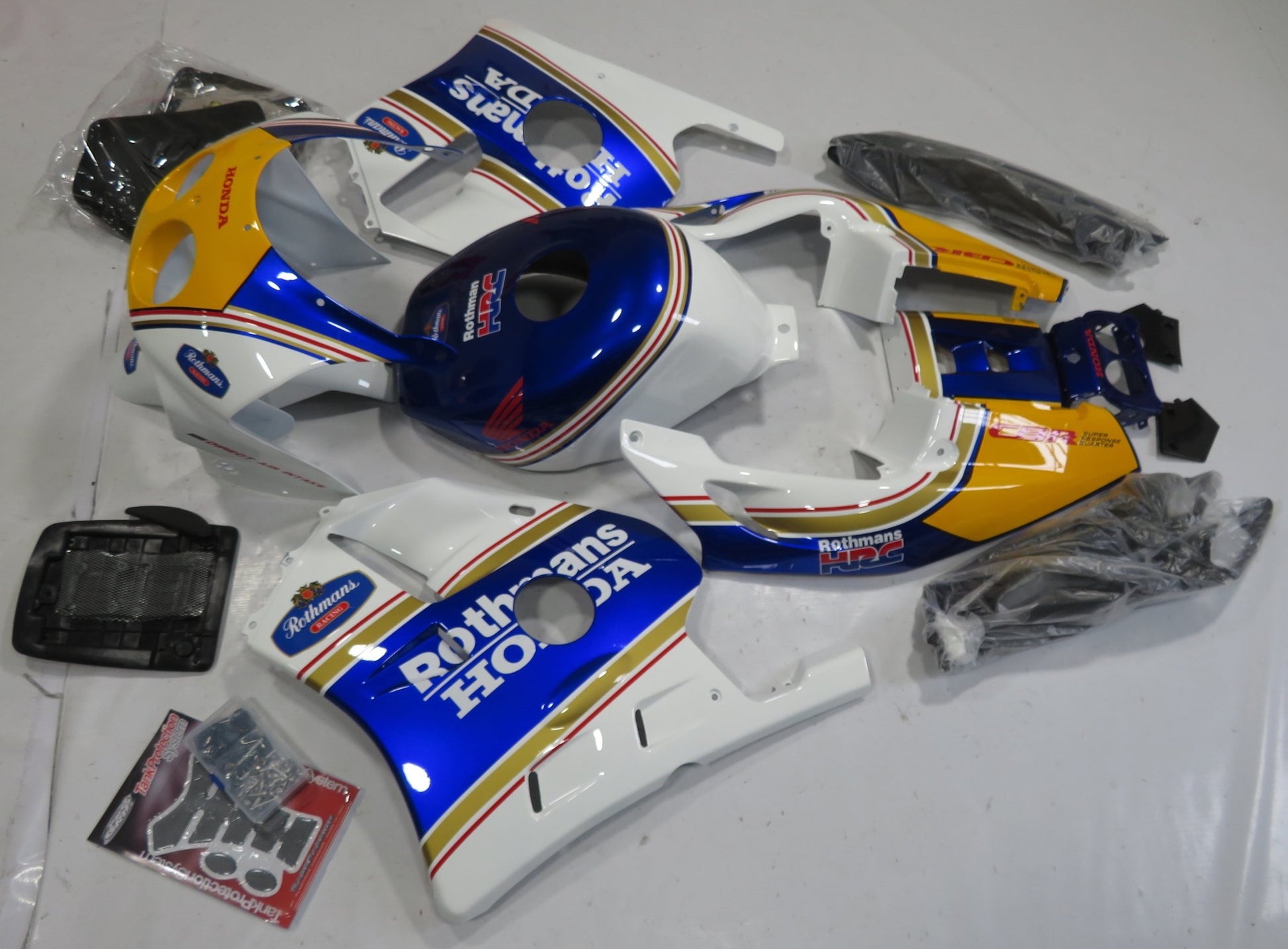 Honda CBR250 MC22 (1990-1998) White, Blue, Yellow, Red & Gold Rothmans Fairings