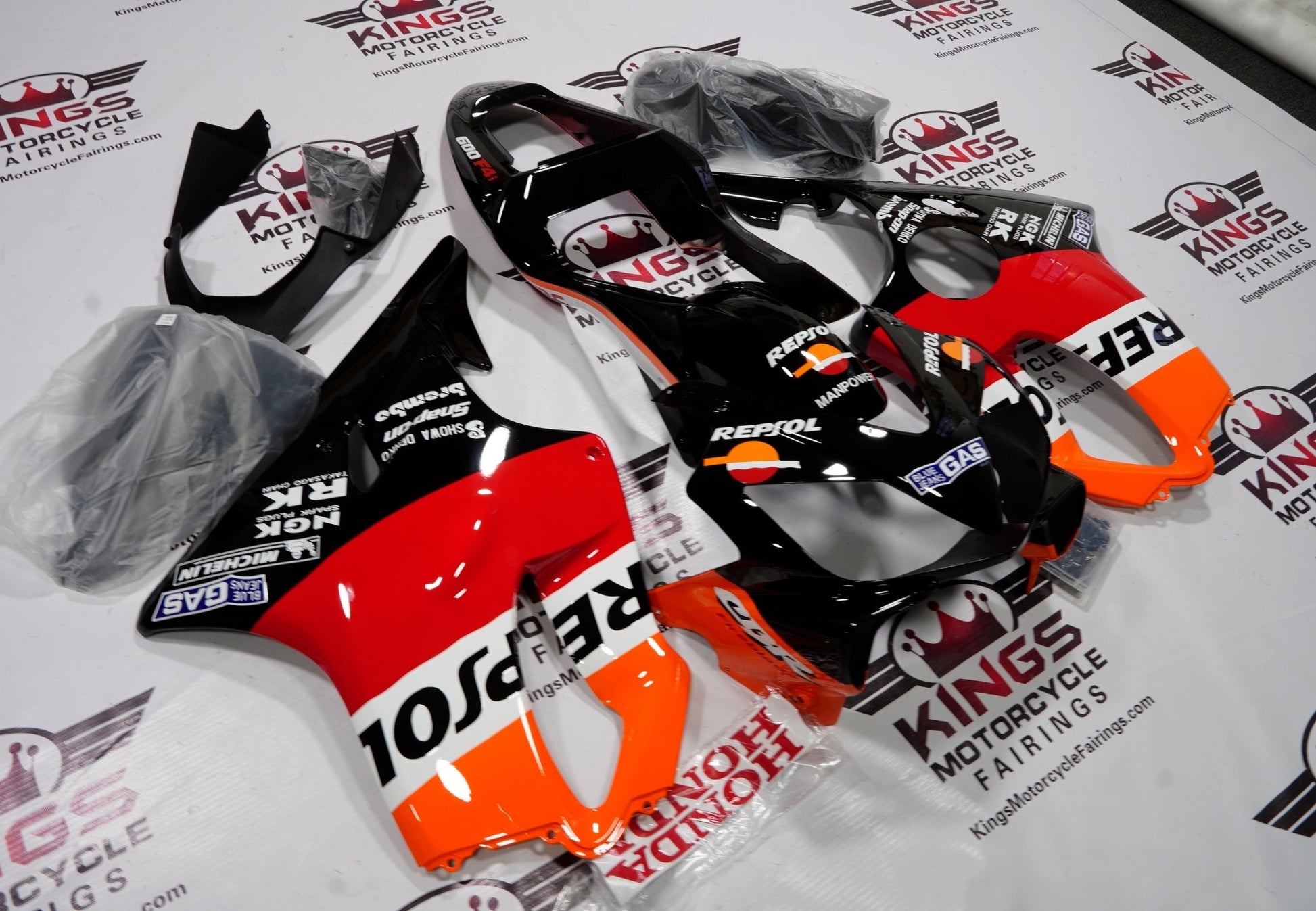 Honda CBR600F4i (2001-2003) Black, Orange, Red & White Repsol Fairings at KingsMotorcycleFairings.com