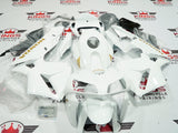 White and Gold Fairing Kit for a 2005 and 2006 Honda CBR600RR motorcycle at KingsMotorcycleFairings.com