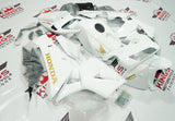 White and Gold Fairing Kit for a 2005 and 2006 Honda CBR600RR motorcycle at KingsMotorcycleFairings.com