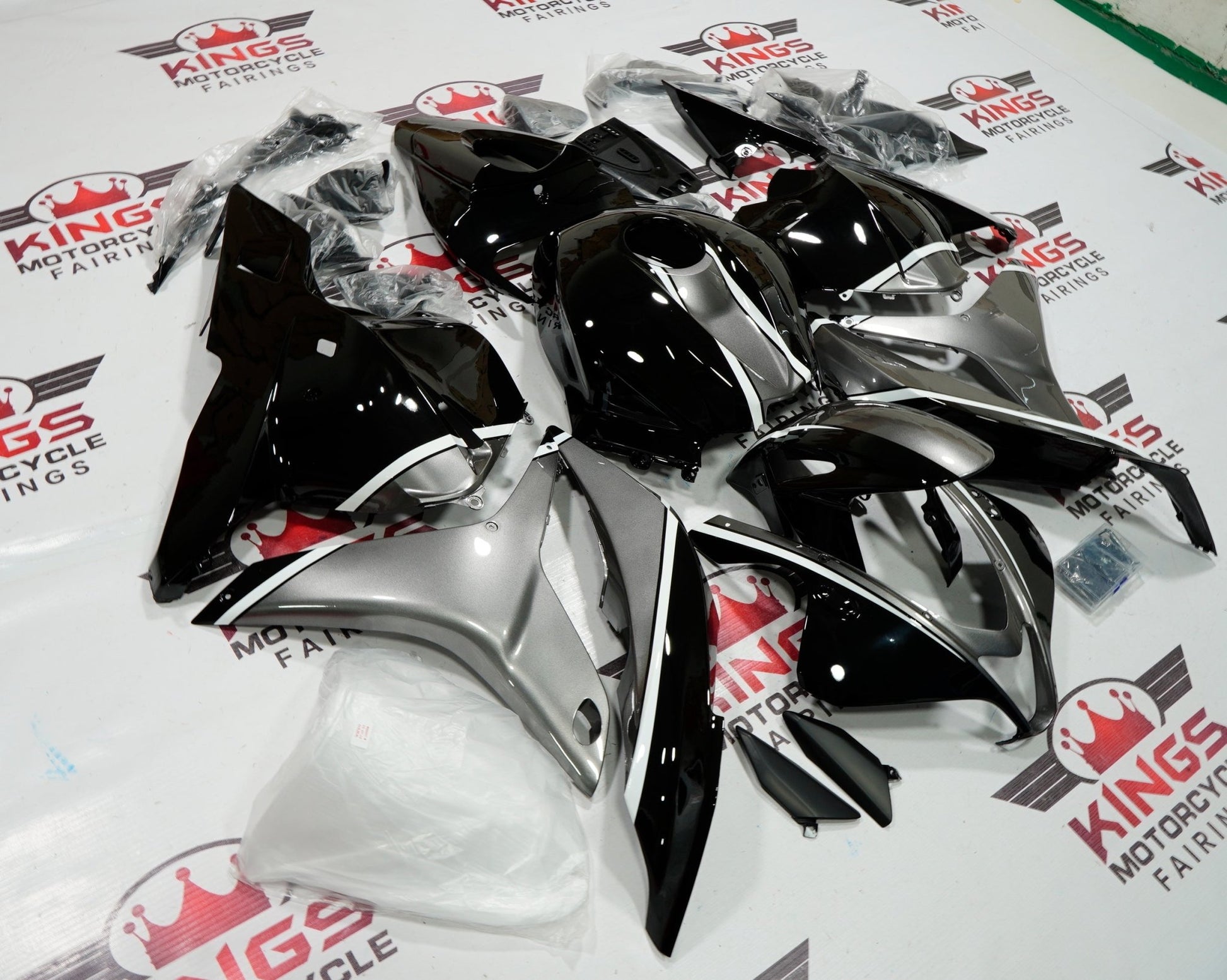 Black, Silver and White Bridgestone Fairing Kit for a 2009, 2010, 2011 & 2012 Honda CBR600RR motorcycle - KingsMotorcycleFairings.com