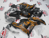 Matte Black and Orange Graffiti Fairing Kit for a 2009, 2010, 2011 & 2012 Honda CBR600RR motorcycle