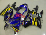 Blue, Black, Yellow and White Movistar Fairing Kit for a 2002 and 2003 Honda CBR900RR 954 motorcycle at KingsMotorcycleFairings.com