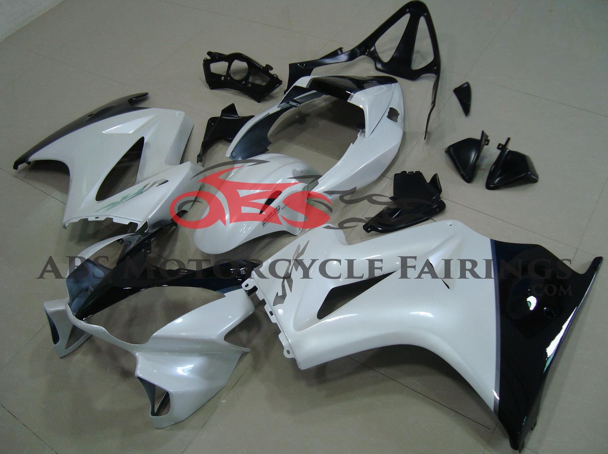 Pearl White, Black and Silver Fairing Kit for a 2002, 2003, 2004, 2005, 2006, 2007, 2008, 2009, 2010, 2011, 2012 and 2013 Honda VFR800 motorcycle at KingsMotorcycleFairings.com