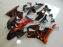 Honda CBR900RR Fairings (1998-1999) Black, Orange Corona from KingsMotorcycleFairings.com