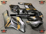 Matte Black and Yellow Repsol Fairing Kit for a 2004 and 2005 Honda CBR1000RR motorcycle