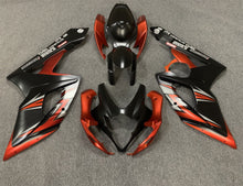Matte Black, Matte Orange and Matte Silver Fairing Kit for a 2005 & 2006 Suzuki GSX-R1000 motorcycle