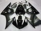 Matte Black and Gloss Black Fairing Kit for a 2003 & 2004 Yamaha YZF-R6 motorcycle