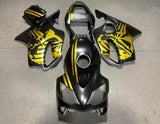 Matte Black and Gold Skull Fairing Kit for a 2001, 2002, 2003 Honda CBR600F4i motorcycle