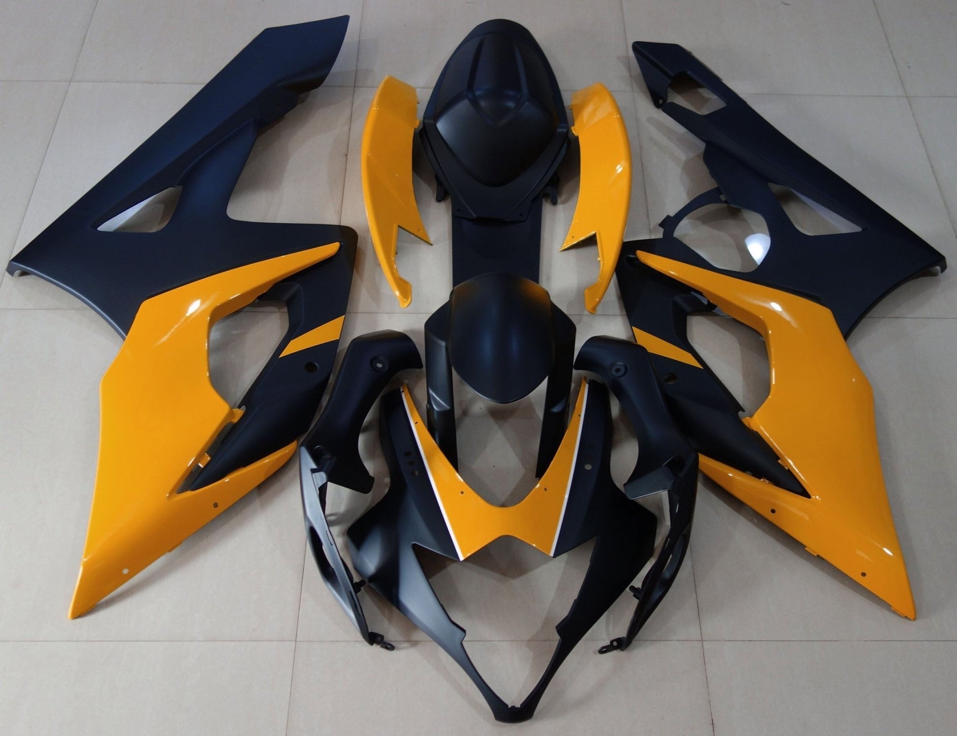Matte Black and Orange Fairing Kit for a 2005 & 2006 Suzuki GSX-R1000 motorcycle