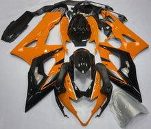 Orange, Black and Silver Fairing Kit for a 2005 & 2006 Suzuki GSX-R1000 motorcycle
