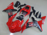 Red, Matte Black and Silver Fairing Kit for a 2002 & 2003 Yamaha YZF-R1 motorcycle.
