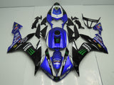 Blue, Black and White Monster Energy Fairing Kit for a 2004, 2005 & 2006 Yamaha YZF-R1 motorcycle.