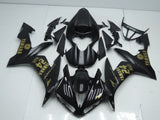 Matte Black, Gloss Black and Gold Fairing Kit for a 2004, 2005 & 2006 Yamaha YZF-R1 motorcycle