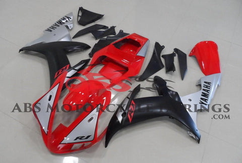 Red, Matte Black and Silver Fairing Kit for a 2002 & 2003 Yamaha YZF-R1 motorcycle.