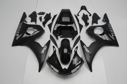 Gloss Black, Matte Black and Silver Fairing Kit for a 2003 & 2004 Yamaha YZF-R6 motorcycle