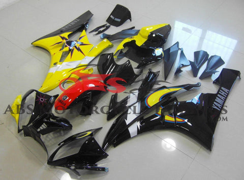 Black, Yellow, Sun and Moon Fairing Kit for a 2006 & 2007 Yamaha YZF-R6 motorcycle