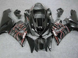 Black, Red and White Flame Fairing Kit for a 2005 & 2006 Kawasaki ZX-6R 636 motorcycle