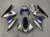 Silver, Blue, Black and White Fairing Kit for a 2005 Yamaha YZF-R6 motorcycle