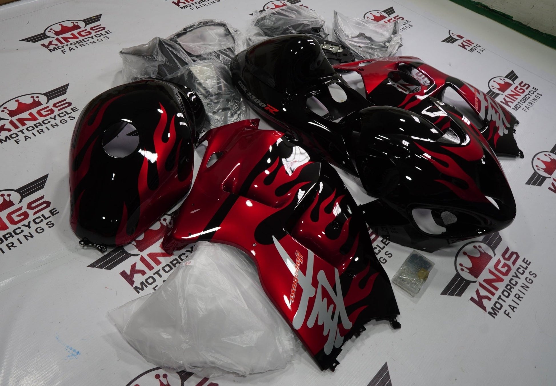 Candy Apple Red Flames, Black and Gray Fairing Kit for a 1999, 2000, 2001, 2002, 2003, 2004, 2005, 2006, & 2007 Suzuki GSX-R1300 Hayabusa motorcycle