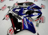 Blue, Black, White and Red Fairing Kit for a 2009, 2010, 2011 & 2012 Triumph Daytona 675 motorcycle