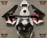 White, Black and Red Splatter Fairing Kit for a 2003 and 2004 Honda CBR600RR motorcycle