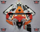 White, Orange and Red Repsol Yutaka Fairing Kit for a 2003 and 2004 Honda CBR600RR motorcycle