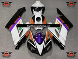 White, Black, Orange, Green and Blue Fairing Kit for a 2004 and 2005 Honda CBR1000RR motorcycle