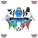 Blue, Red, Green and White Fairing Kit for a 2002 & 2003 Yamaha YZF-R1 motorcycle.