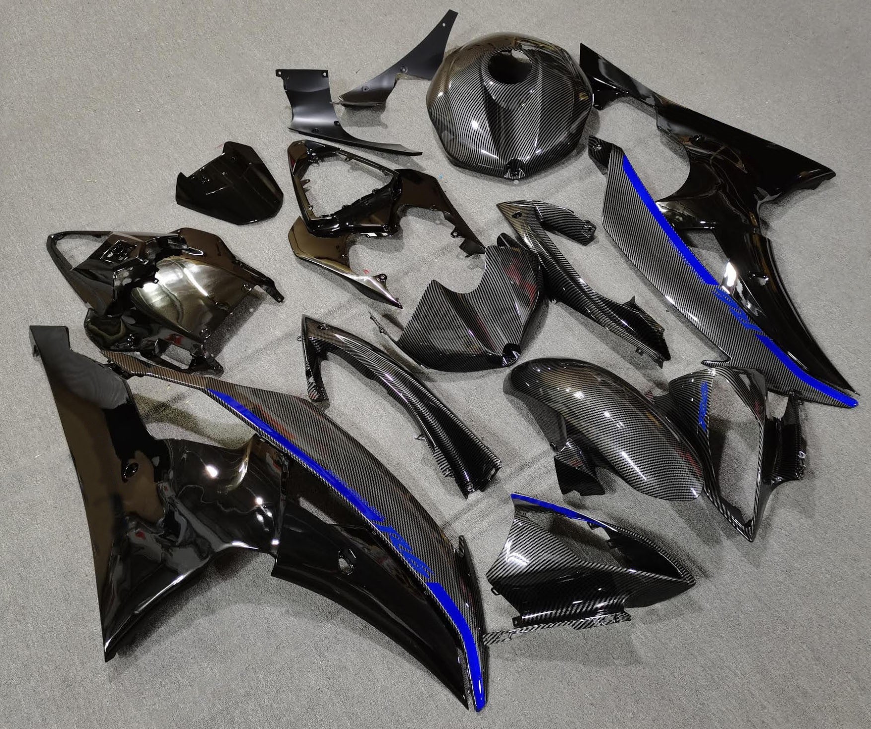 Faux Carbon Fiber, Black and Blue Fairing Kit for a 2008, 2009, 2010, 2011, 2012, 2013, 2014, 2015 & 2016 Yamaha YZF-R6 motorcycle