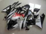 White and Black Fairing Kit for a 2009, 2010, 2011 & 2012 Kawasaki Ninja ZX-6R 636 motorcycle.