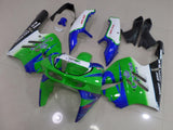 Green, Blue, White and Black fairing kit for a 1994, 1995, 1996 & 1997 Kawasaki ZX-9R motorcycle. This is a compression molded fairing kit which will require modifications for proper fitment