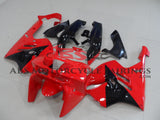 Red and Black fairing kit for a 1994, 1995, 1996 & 1997 Kawasaki ZX-9R motorcycle. This is a compression molded fairing kit which will require modifications for proper fitment
